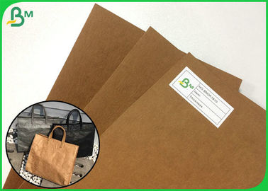 Nuevo estilo reutilizable y papel de Kraft lavable plegable para hacer la bolsa de mensajero